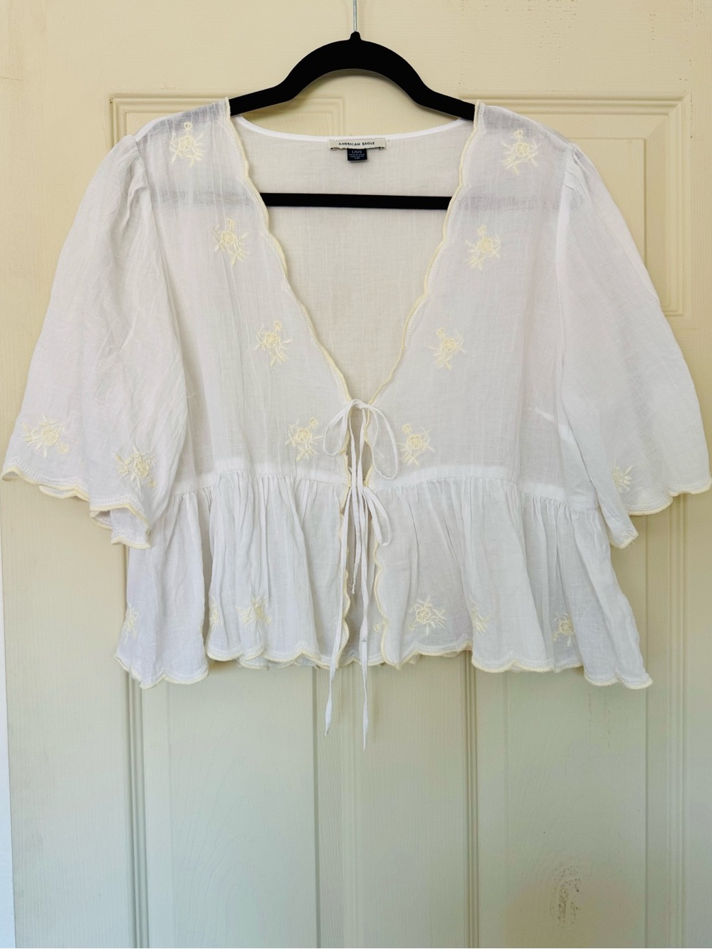 American Eagle Outfitters White Peplum Tie-Front Blouse with Cream Embroidery